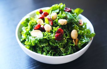 Kale salad with dried fruit and almonds