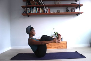 7. Modified Boat Pose (Paripurna Navasana)