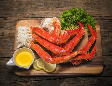 Vitamin B12-rich Alaskan King Crab legs with butter and lemons.