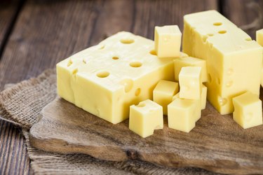 Vitamin B12-rich Swiss cheese on cutting board.
